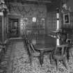 Interior. Ground floor view of dining room from West showing original furnishings, fittings and stags heads installed for the Earls of Fife looking through the smoking room, entrance hall and into the drawing room