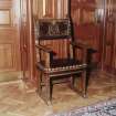 Interior. Ground floor detail of entrance hall stamped leather chair