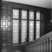 Interior. Detail of decorative leaded light staircase window