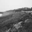 Distant view from North of Hallgreen Castle with foreshore in foreground.