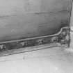 Interior, cell block.
Detail showing specimen corridor door bottom hinge on second floor.