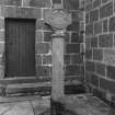 Detail of entrance showing 1790 datestone lintel & Mercat Cross