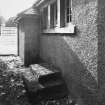 Mortuary.
Detail showing steps and window.