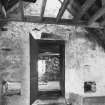 Interior.
View showing door providing access from mill onto kiln floor.