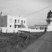 General view of lighthouse, keepers' house and compound from SW