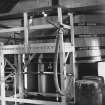 Interior.
View of filling-store showing spirit-receiver and filling apparatus.