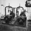 Interior.
Detail of two water pumps for Crossley engine cooling system.