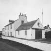 General view of coastguard station and houses from SE