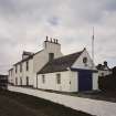 General view of coastguard station and houses from SE