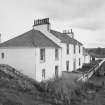 View of houses at N end of coastguard station from W