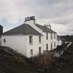 View of houses at N end of coastguard station from W