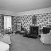 Interior.  Second floor. Principal guest bedroom with dramatic floral wallpaper.