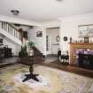 Interior. Ground floor. Living Hall. View from SW showing stair and fireplace