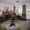 Interior. Ground floor. Living Hall. View from NW showing fireplace and glazed screen to loggia