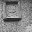 Cullen Church. Detail of heraldic emblem on S side of chancel.