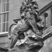 Detail statue (of a lion atop a rock) on main entrance terraces.