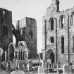 Copy of historic photograph showing general view of transept and west towers from SE.