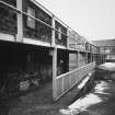 View from E of warehouse no.5 showing gantry providing access to upper floor.