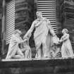 Detail of statue above main entrance of N elevation.