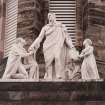Detail of statue above main entrance of N elevation.