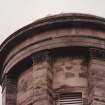 Detail of pilaster capitals of bell tower.