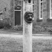 Detail of cast iron fountain with lion's head.