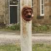 Detail of cast iron fountain with lion's head