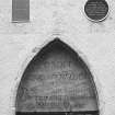 Detail of inscribed panel over door