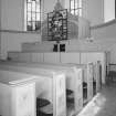 Interior. Pews. Detail