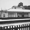 Platform view: NW elevation of station building.