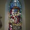 Interior. E wall S stained glass window attributed to Gordon Strachan of The Nativity