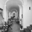 Interior. View of barrel vaulted ground floor hall from W