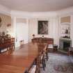 Interior. View of dining room from S showing canted corner fireplace