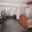 Interior. View of first floor master bedroom from N