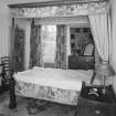 Interior. View of first floor bedroom, former dressing room from N