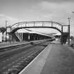 View of footbridge and platform 1 from S