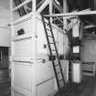 Mill Room: view at upper level from north of malt dressing machine.