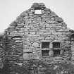 Dwelling, mural recesses, vent and blocked doorway on east face of partition wall