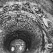 Corn-drying kiln, view of kiln-bowl from above showing remains of roof structure