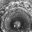 Corn-drying kiln, view of kiln-bowl from above showing remains of roof structure