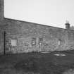 View of east wall of courtyard from south east