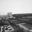 Castle with walled garden in foreground, view from roof of corner tower