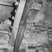 Detail of cruck showing jointing and split pegs with wedges