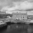 View of harbour and warehouse from south