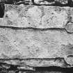 Fragment of incised cross-slab in north west side wall