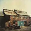 Photographic copy of colour polaroid showing general view of kipper kilns.