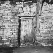 Internal face of winnowing-door in north east wall of barn