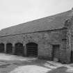 Courtyard, view of cart-shed from North West.