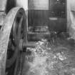 View of switchboard and generator mounting head, on left engine flywheel