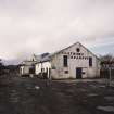 View of E end of former creamery from SE